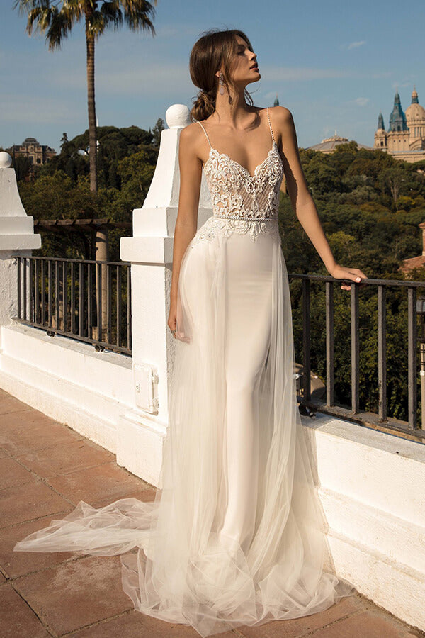 Impresionante vestido de novia largo de sirena con cola de capilla, tul y espalda descubierta