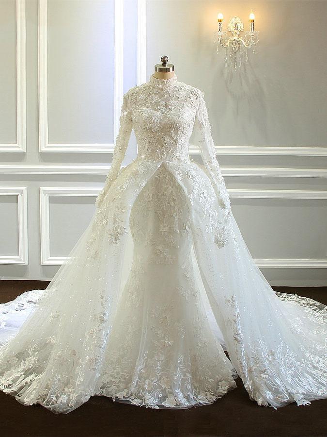 Impresionantes vestidos de novia largos de sirena con cuello alto, tul y encaje, con mangas.