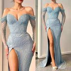 Impresionante vestido de fiesta largo de sirena con hombros descubiertos, abertura, encaje, lentejuelas y mangas largas.