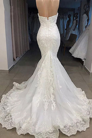Magnifique robe de mariée sirène longue à décolleté cœur et manches en dentelle appliquée