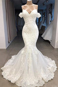 Magnifique robe de mariée sirène longue à décolleté cœur et manches en dentelle appliquée
