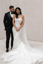 Impresionante vestido de novia largo blanco sin mangas con tirantes finos de encaje estilo sirena y apliques
