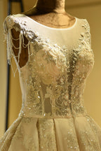 Magnifique robe de mariée princesse en tulle ivoire à lacets et perles scintillantes 