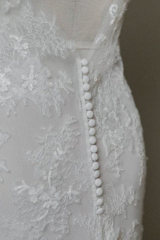 Impresionantes vestidos de novia de sirena con apliques y escote en V 