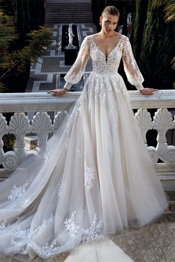 Magnifique robe de mariée dos nu à col en V, manches longues et appliques de coupe trapèze