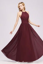 Vestido largo de noche de gasa con apliques, cuello halter, sin mangas y largo hasta el suelo, con volantes y corte en A.