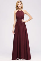 Vestido largo de noche de gasa con apliques, cuello halter, sin mangas y largo hasta el suelo, con volantes y corte en A.