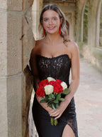 Arabelle | Vestido largo de fiesta negro sin tirantes con apliques estilo sirena y abertura