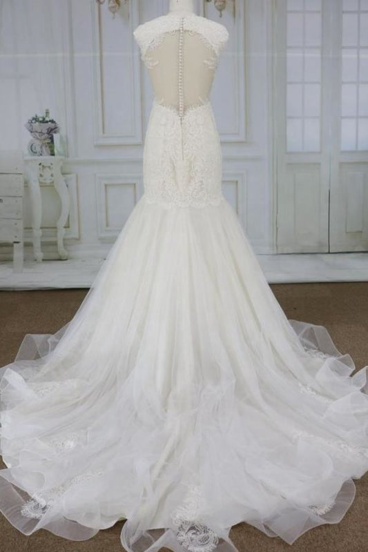 Magnifiques robes de mariée sirène en tulle ornées d'appliqués. 