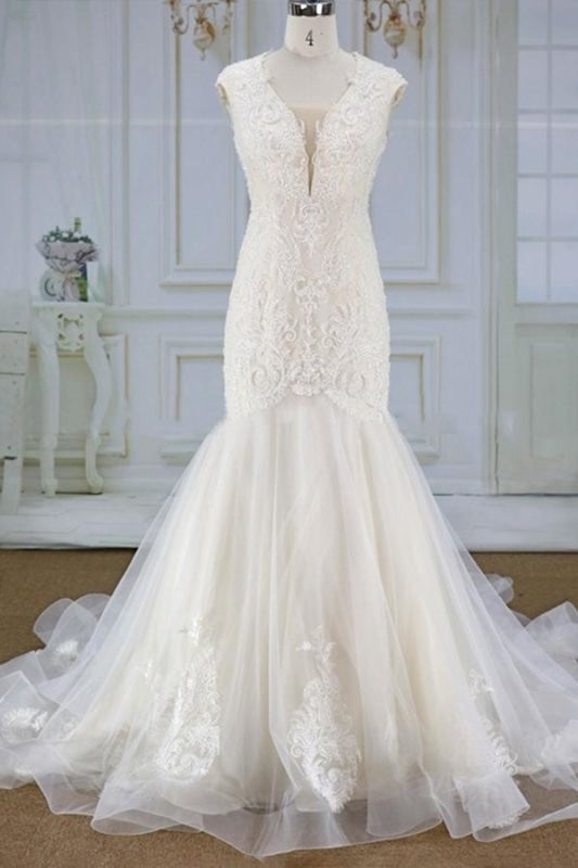 Magnifiques robes de mariée sirène en tulle ornées d'appliqués. 
