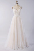 Impresionante vestido de novia largo de corte A con apliques, encaje, tul y espalda descubierta