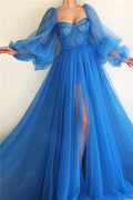 Magnifique robe de bal longue trapèze en tulle avec fente sur le devant et manches