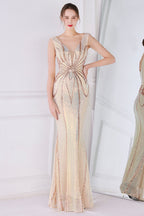 Robe de bal fourreau à sequins dorés et franges