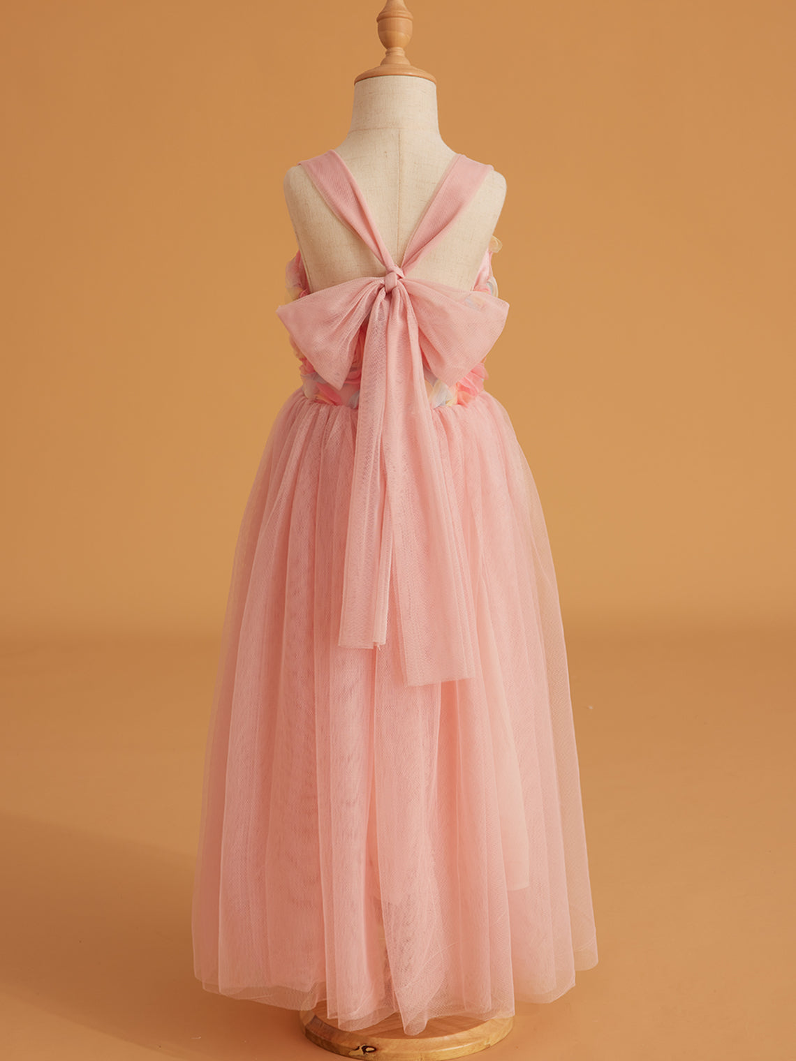 Vestido de bebé niña con lazo de tul y aplique floral en 3D de la colección Jardín Encantado 