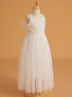 Vestido de bebé niña con lazo de tul y aplique floral en 3D de la colección Jardín Encantado 