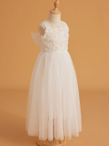 Vestido de bebé niña con lazo de tul y aplique floral en 3D de la colección Jardín Encantado 