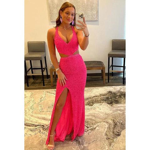 Robe de bal longue à bretelles croisées et découpes pailletées et col en V