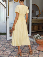 Robe longue oversize à manches bouffantes et col en V 