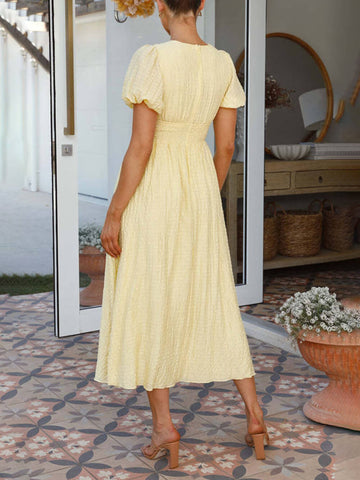 Vestido largo de manga abullonada, cuello en V y bajo extragrande 