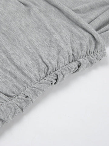 Vestidos largos de noche ajustados, plisados, de color liso, con abertura en la entrepierna y hombros descubiertos. 