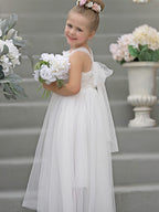 Vestido de bebé niña con lazo de tul y aplique floral en 3D de la colección Jardín Encantado 