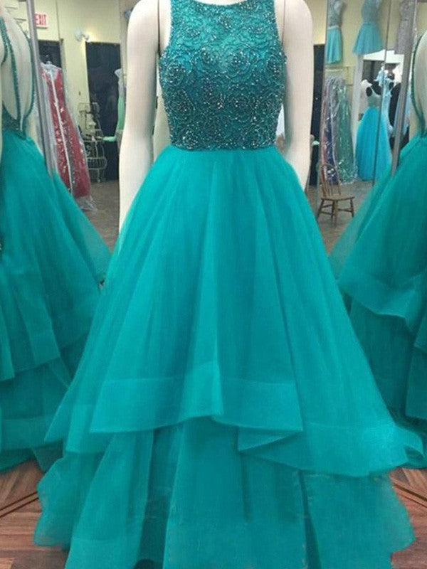 Vestidos de baile de organza con escote redondo, sin mangas y hasta el suelo, con cuentas y corte de gala.