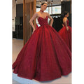 Robe de soirée longue bordeaux à col en V et poches 