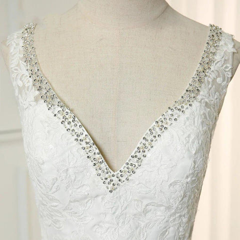 Vestido de novia de playa con escote en V doble, sin mangas, con apliques de cuentas, corte A, de gasa 