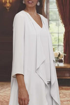 Magnifique robe longue en mousseline simple pour la mère de la mariée, avec châle.
