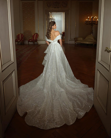 Magnifique robe de mariée sirène longue sans manches à sequins, épaules dénudées