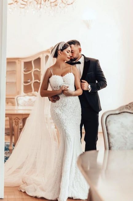 Magnifique robe de mariée sirène longue à fines bretelles en dentelle sans manches