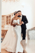 Magnifique robe de mariée sirène longue à fines bretelles en dentelle sans manches