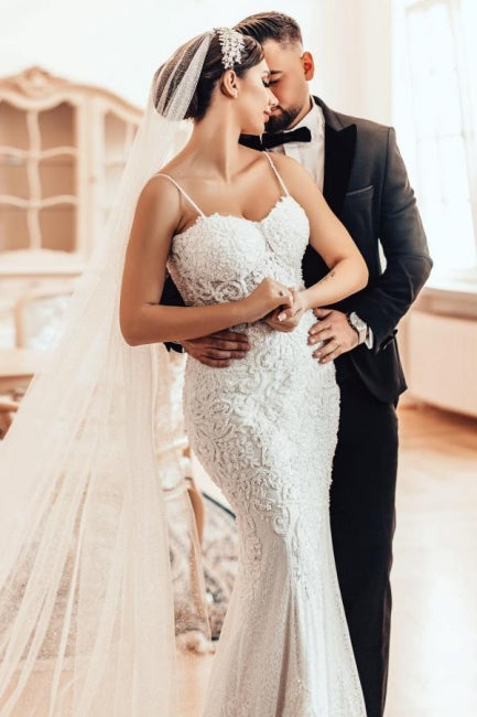 Magnifique robe de mariée sirène longue à fines bretelles en dentelle sans manches