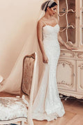 Magnifique robe de mariée sirène longue à fines bretelles en dentelle sans manches