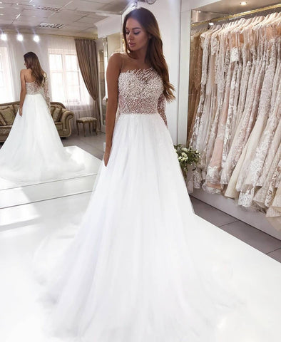 Precioso vestido de novia de manga larga, corte en A, escote barco, encaje de perlas