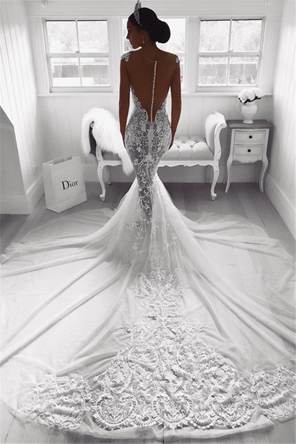 Robe de mariée sirène à bretelles, en tulle transparent sans manches avec appliques.