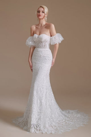 Precioso vestido de novia de sirena sin mangas, con escote barco, encaje y apliques, largo hasta el suelo. 