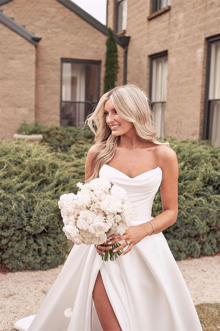 Magnifique robe de mariée blanche simple, coupe trapèze, avec fente latérale