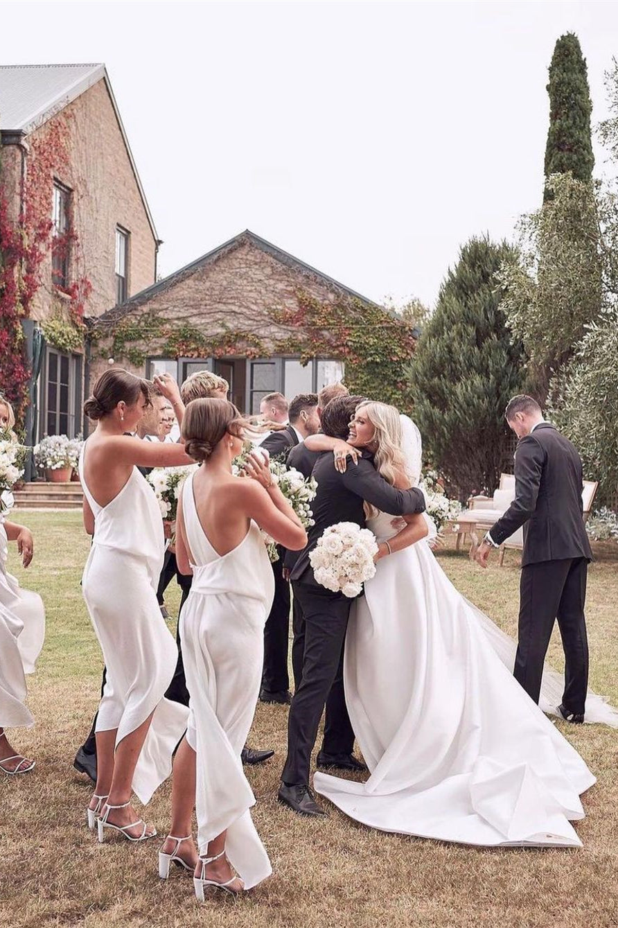 Magnifique robe de mariée blanche simple, coupe trapèze, avec fente latérale