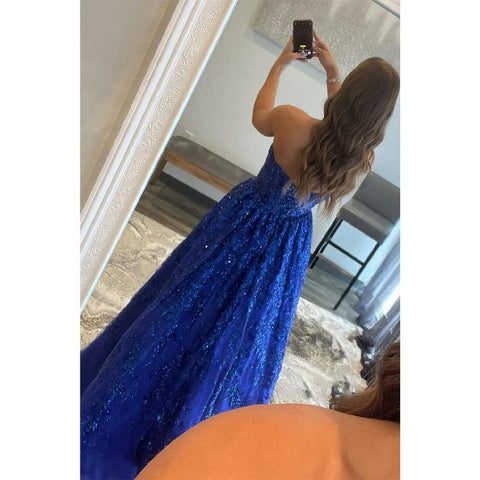 Vestido largo de fiesta de corte A, sin tirantes, con apliques de lentejuelas y bolsillos.