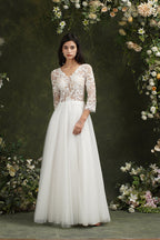 Robe de mariée longue en mousseline et dentelle, coupe trapèze, décolleté cœur et manches, Biztunnel