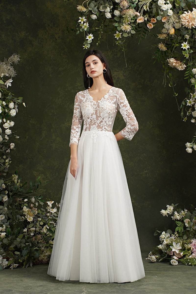 Robe de mariée longue en mousseline et dentelle, coupe trapèze, décolleté cœur et manches, Biztunnel