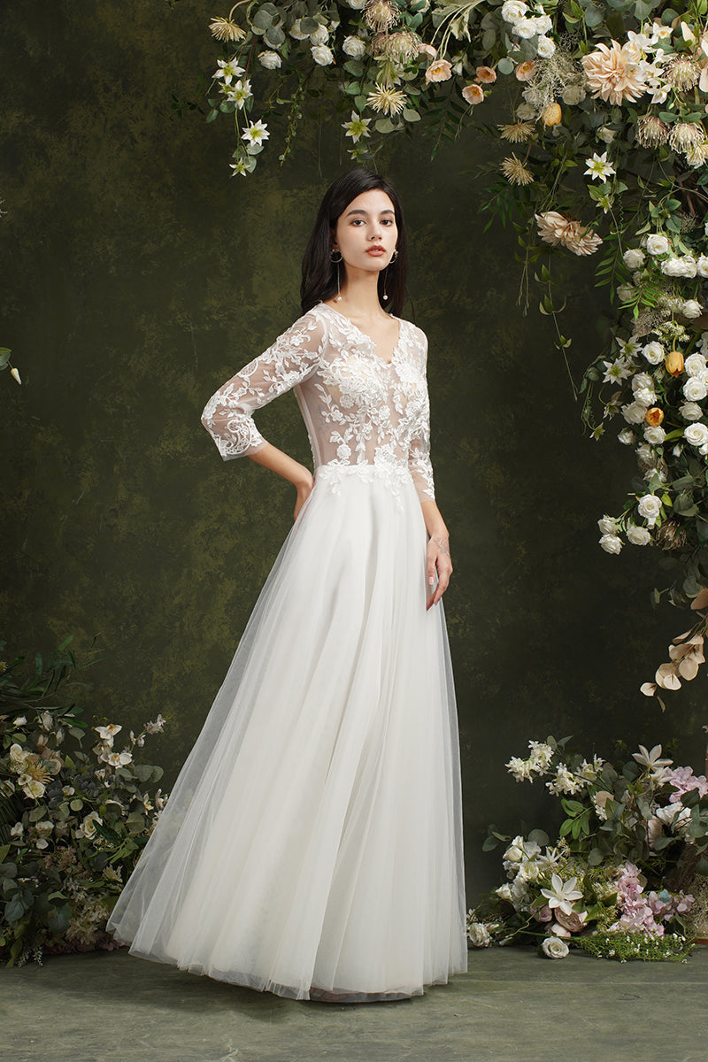 Robe de mariée longue en mousseline et dentelle, coupe trapèze, décolleté cœur et manches, Biztunnel
