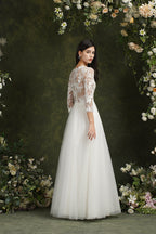 Robe de mariée longue en mousseline et dentelle, coupe trapèze, décolleté cœur et manches, Biztunnel