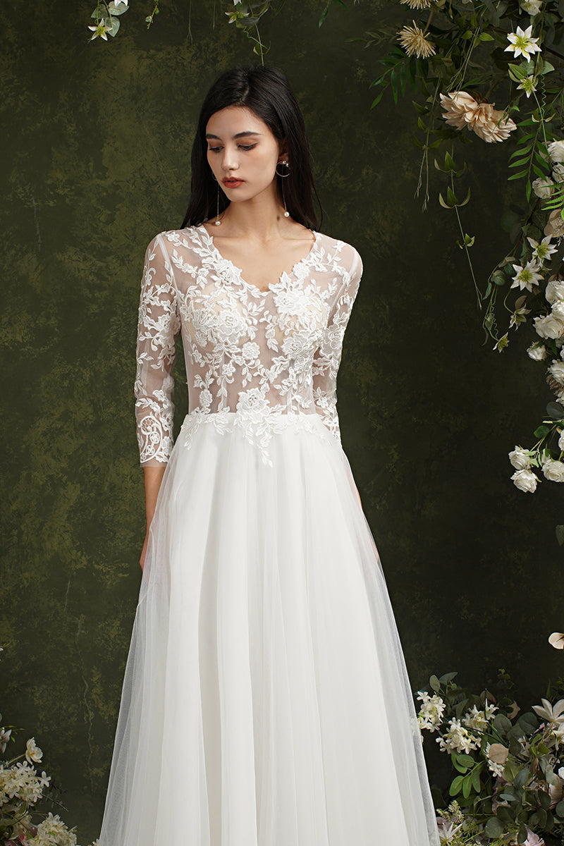 Robe de mariée longue en mousseline et dentelle, coupe trapèze, décolleté cœur et manches, Biztunnel