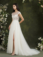 Robe de mariée longue en mousseline et dentelle, coupe trapèze, décolleté cœur et fente, Biztunnel