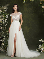 Robe de mariée longue en mousseline et dentelle, coupe trapèze, décolleté cœur et fente, Biztunnel