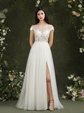 Robe de mariée longue en mousseline et dentelle, coupe trapèze, décolleté cœur et fente, Biztunnel