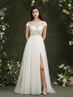 Robe de mariée longue en mousseline et dentelle, coupe trapèze, décolleté cœur et fente, Biztunnel