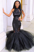 Robe de soirée sirène en tulle noir à dos nu et sans manches, ornée d'appliqués, ornée de tulle.